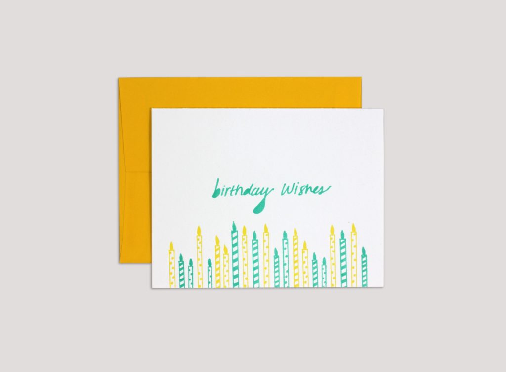 birthday wishes card with illustration of candles and script type